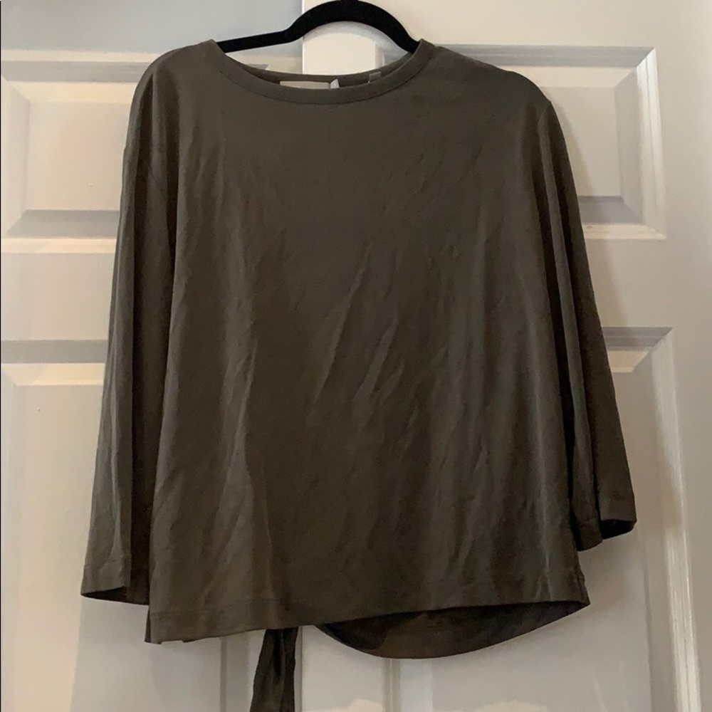 Green long sleeve open back top